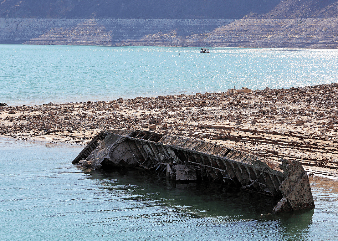 A sunken World War II-Era landing craft is revealed near the Lake Mead Marina as the waterline lowers.