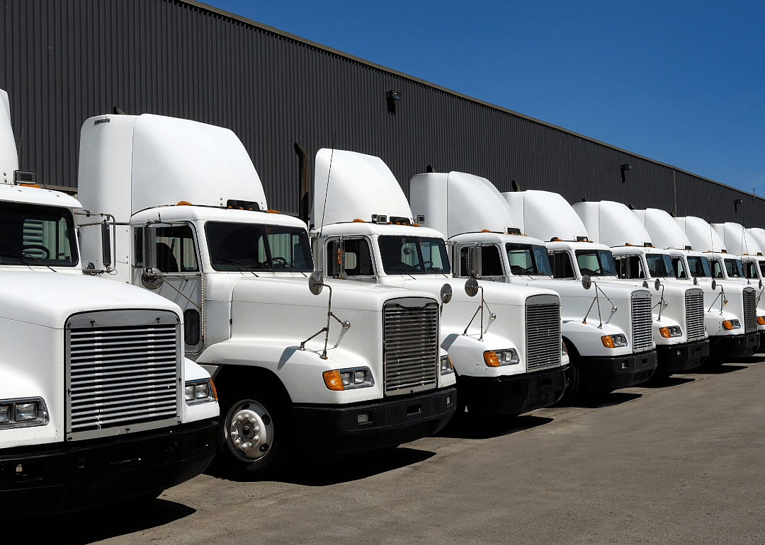 A row of tractor trailers.