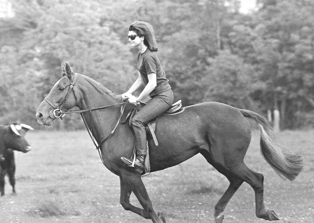 Jackie Kennedy riding on horseback near the time of her engagement