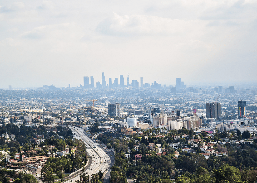 A smoggy Los Angeles in the distance. 