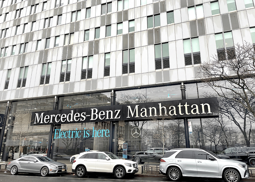 Electric vehicle sign at a Mercedes dealership in Manhattan.