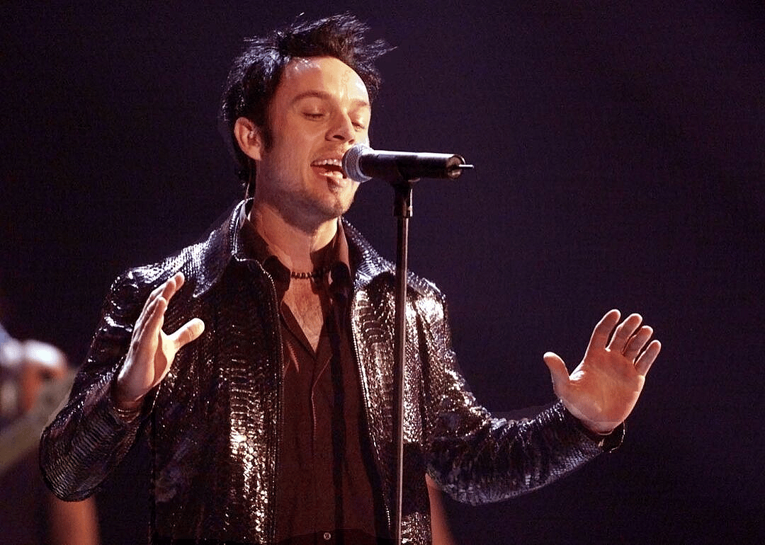 Savage Garden performing onstage.