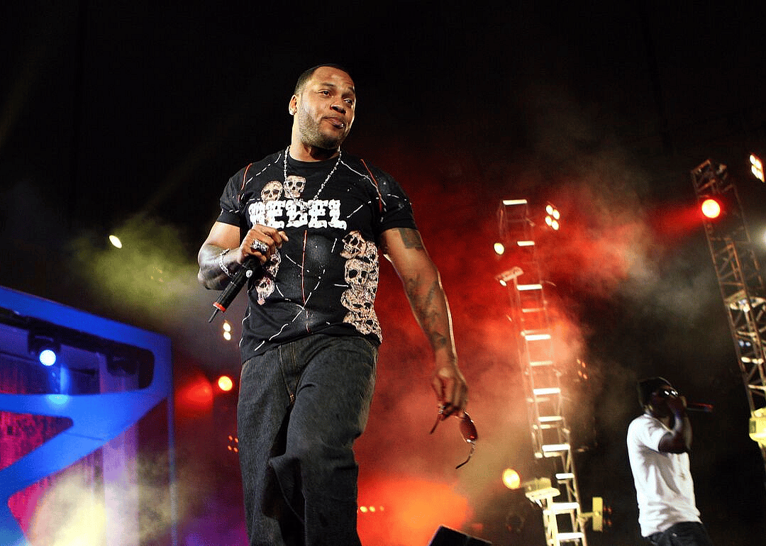 Flo Rida performing onstage.