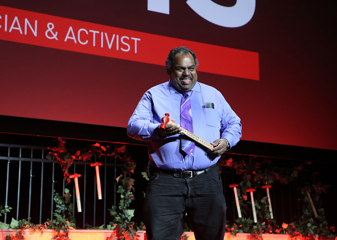  Daryl Davis holds a red-headed hammer on stage during the TDI Awards at the 2017 Tribeca Film Festival.
