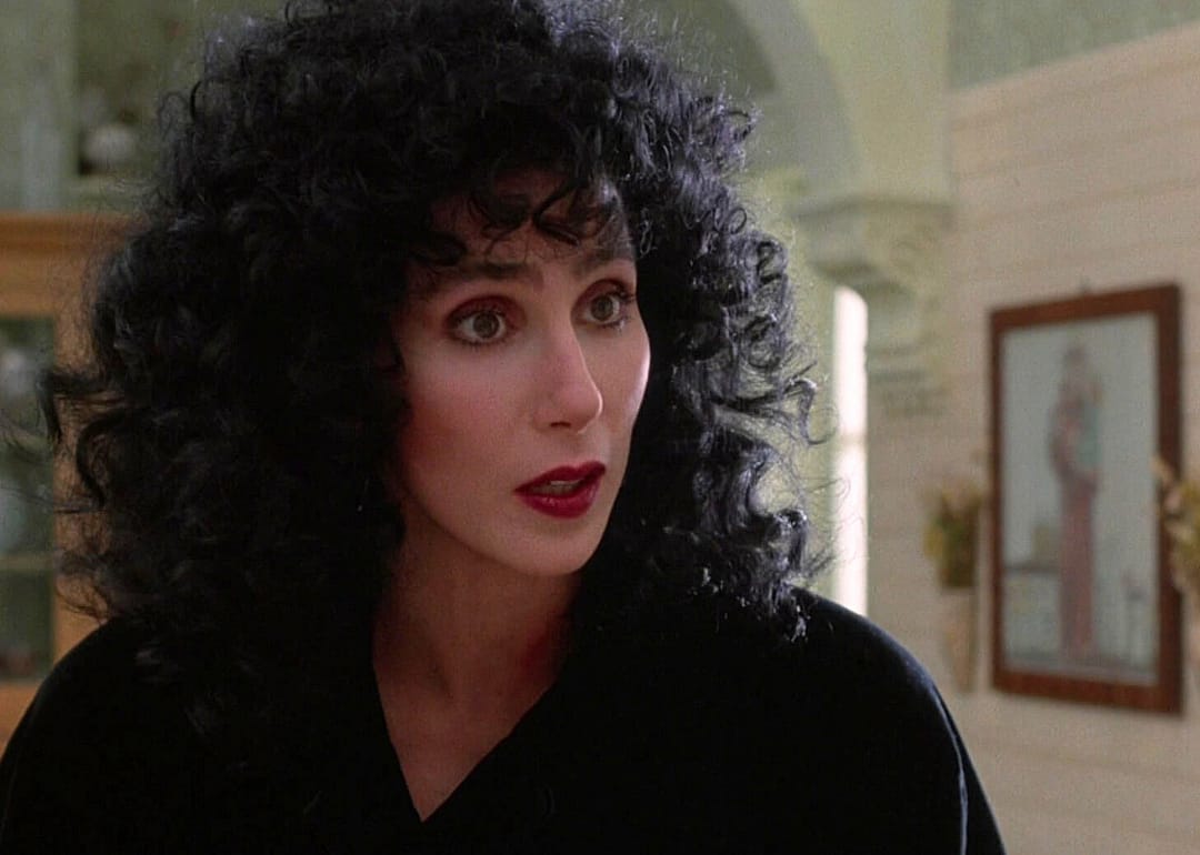 Cher in all black.