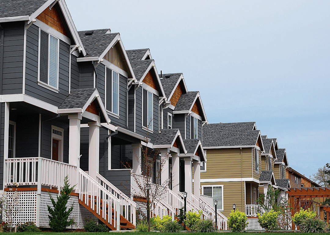 A row of modern, suburban homes in a residential neighborhood.