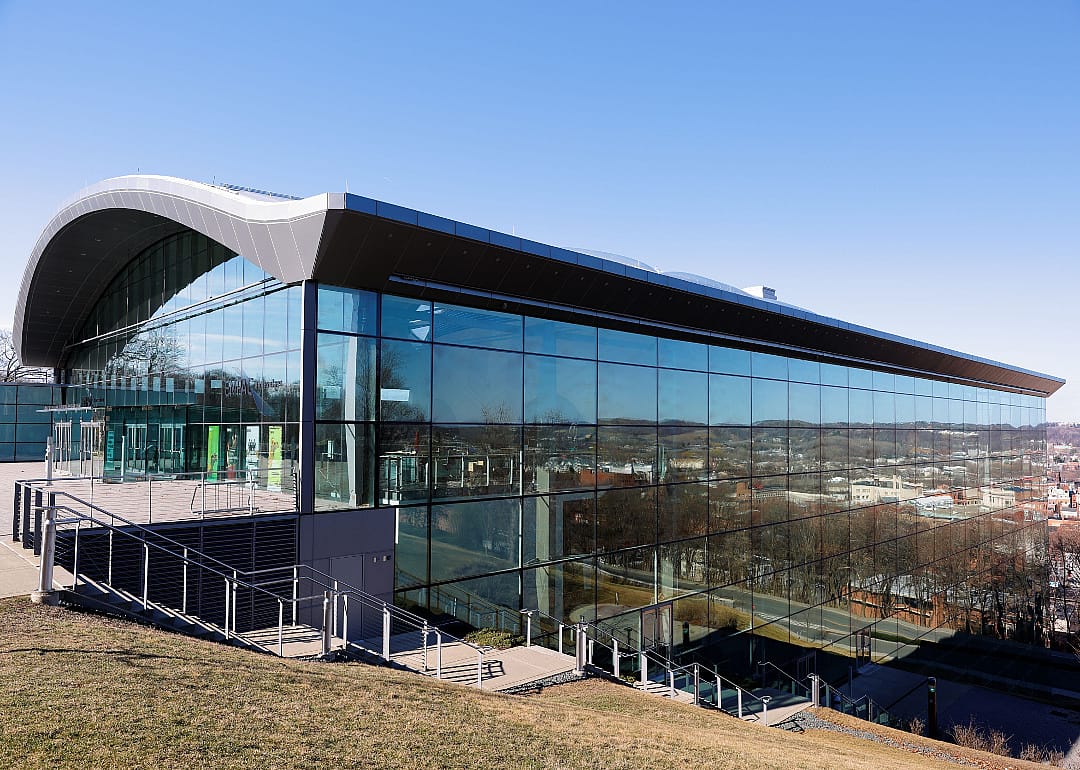 Modern glass university building.