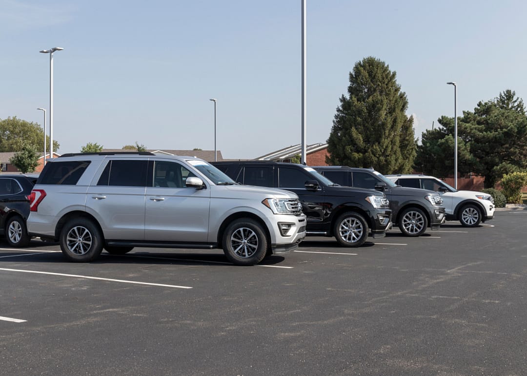 A silver Ford Expedition in a parking lot.