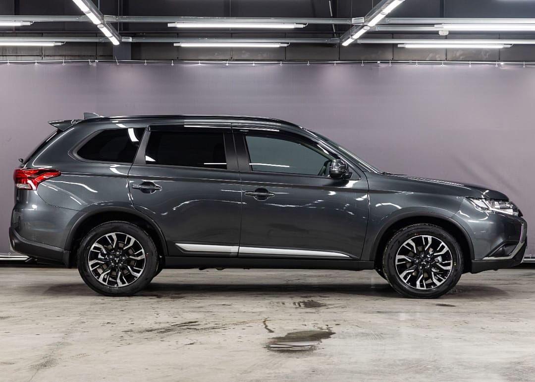 A gray Mitsubishi Outlander.