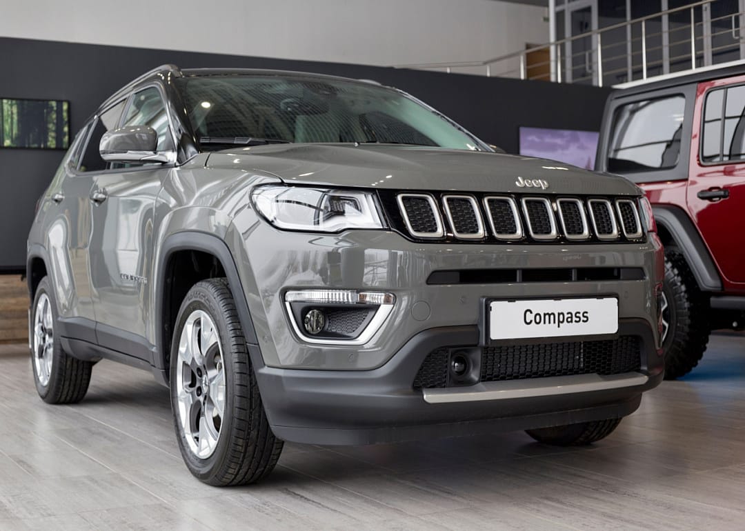 A gray Jeep Compass.