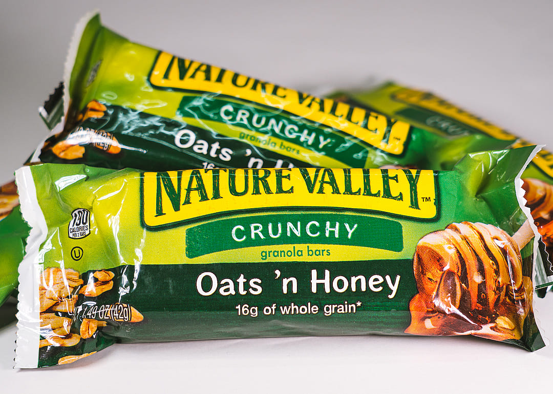Nature Valley Oats ’n Honey bar isolated against white background.
