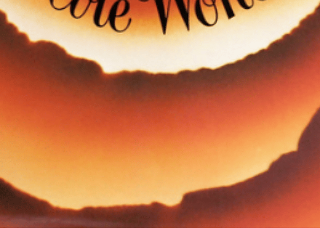 Abstract orange-and-gold shapes with a small amount of black text.