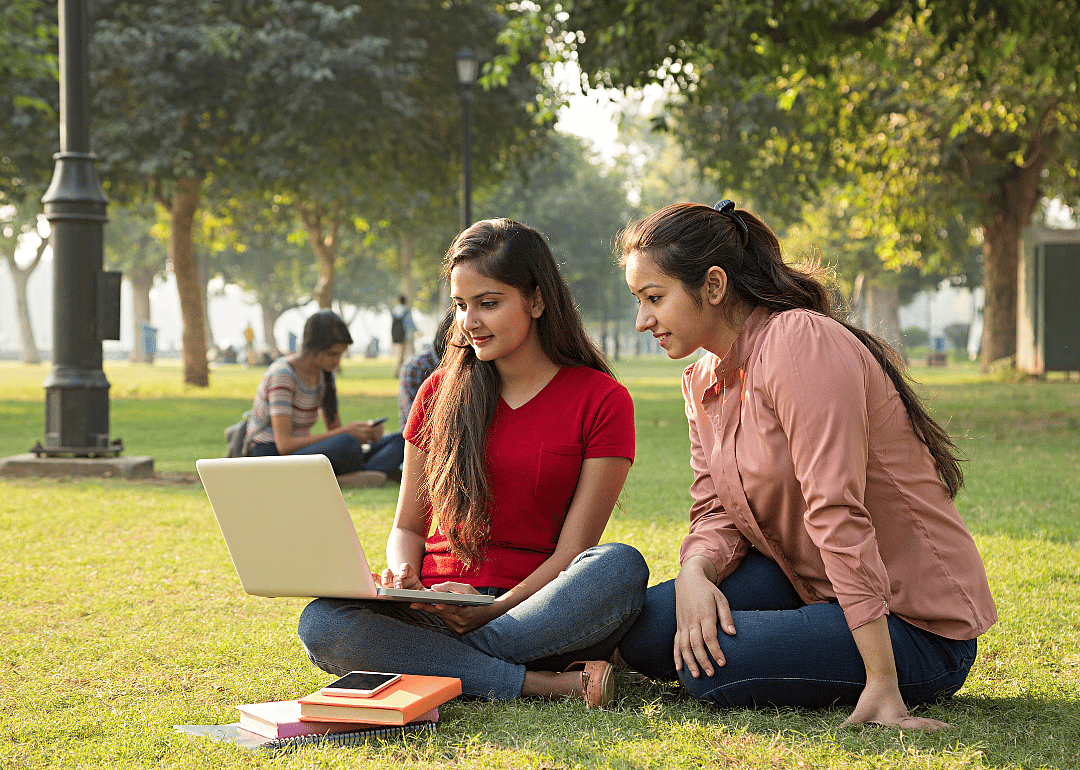 Students on the lawn of a university.