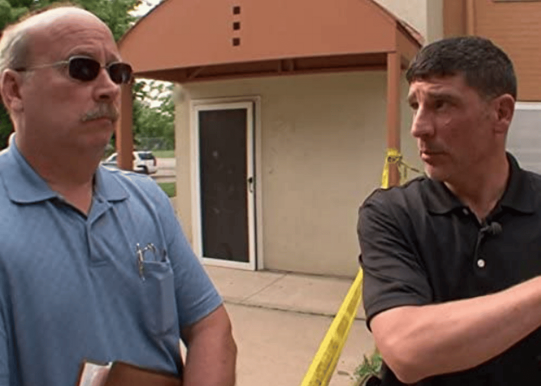 Two detectives at a crime scene