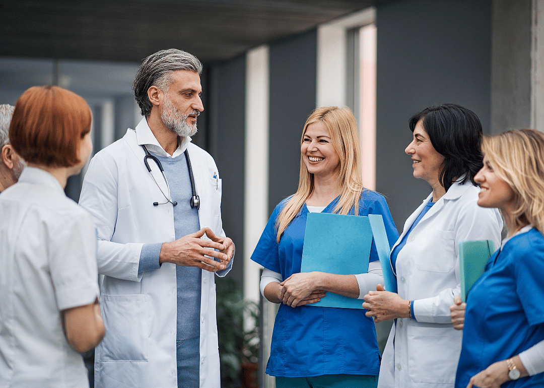 A group of hospital workers having a discussion.