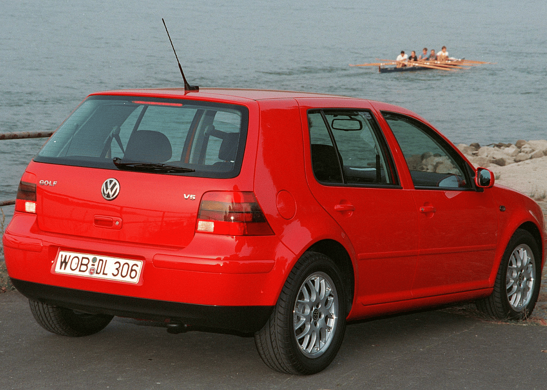 The VW New Golf driving next to a river.