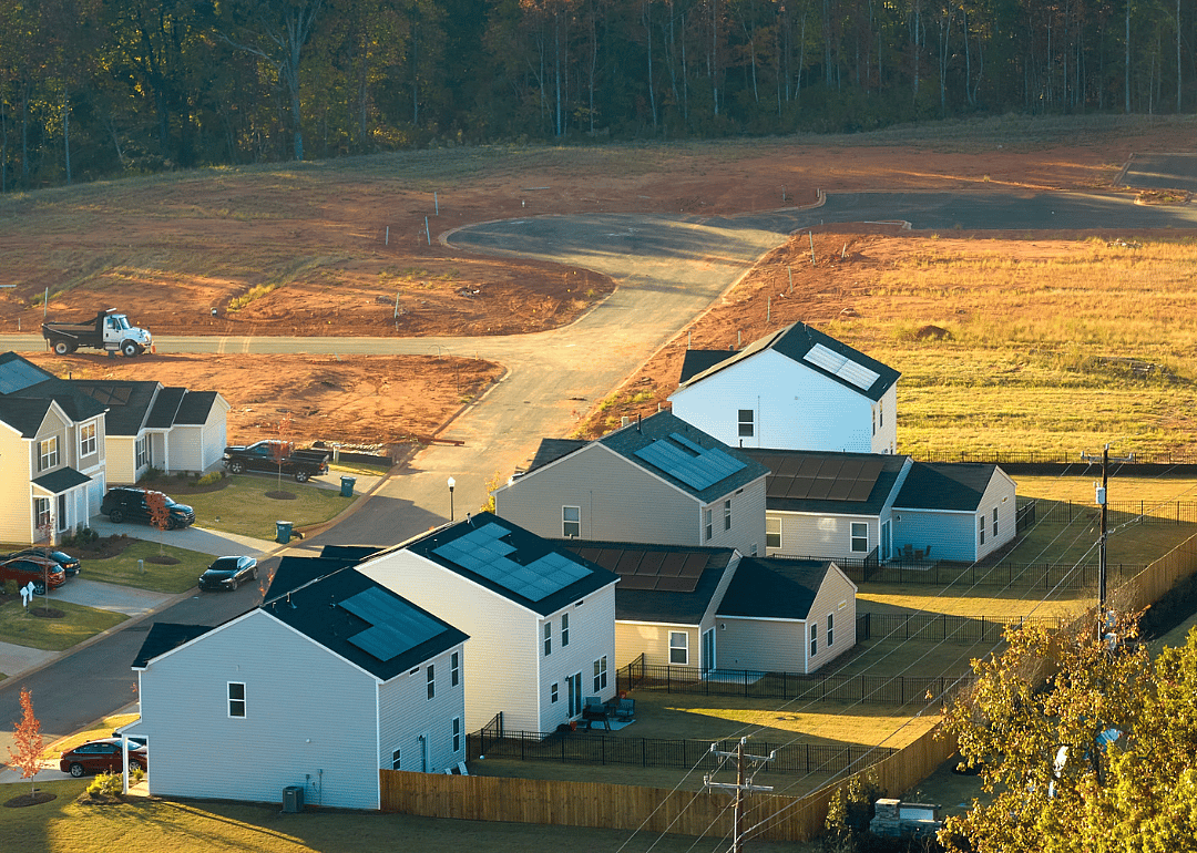 An aerial view of a real estate development's construction site of new, tightly packed homes in South Carolina.