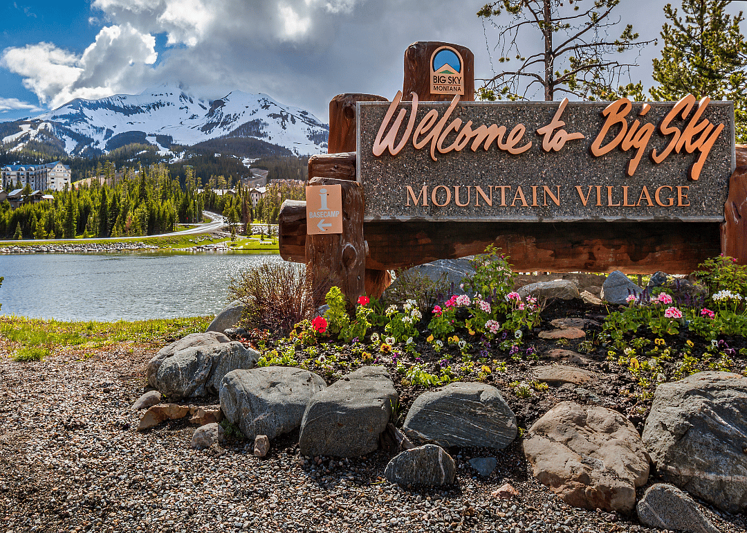 A Welcome to Big Sky Mountain Village sign.