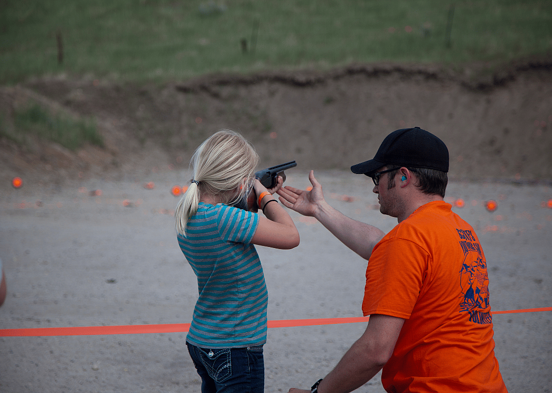 A child learning gun safety and survival skills in Emmett.
