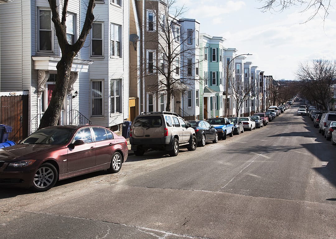South Boston townhouses with cars parked outside.