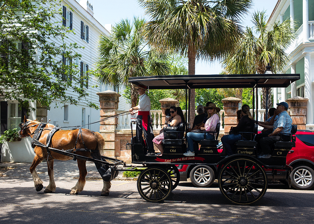 A horse-drawn buggy in the historic 19th-century downtown Charleston, South Carolina, on April 24, 2019.