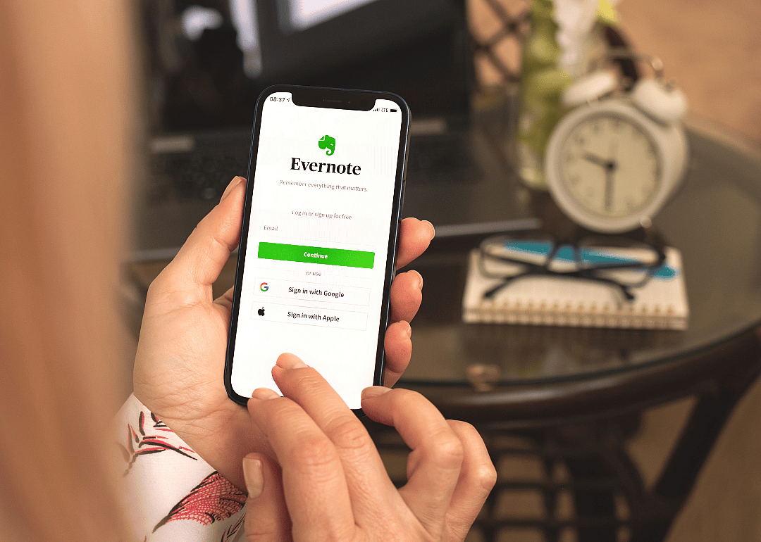 A person logging into Evernote on their phone to access their second brain.