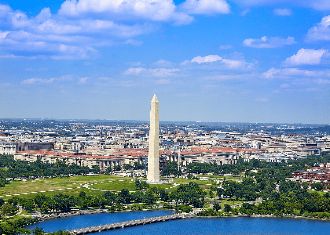 An aerial view of Washington D.C., centered on the Washington Monument.