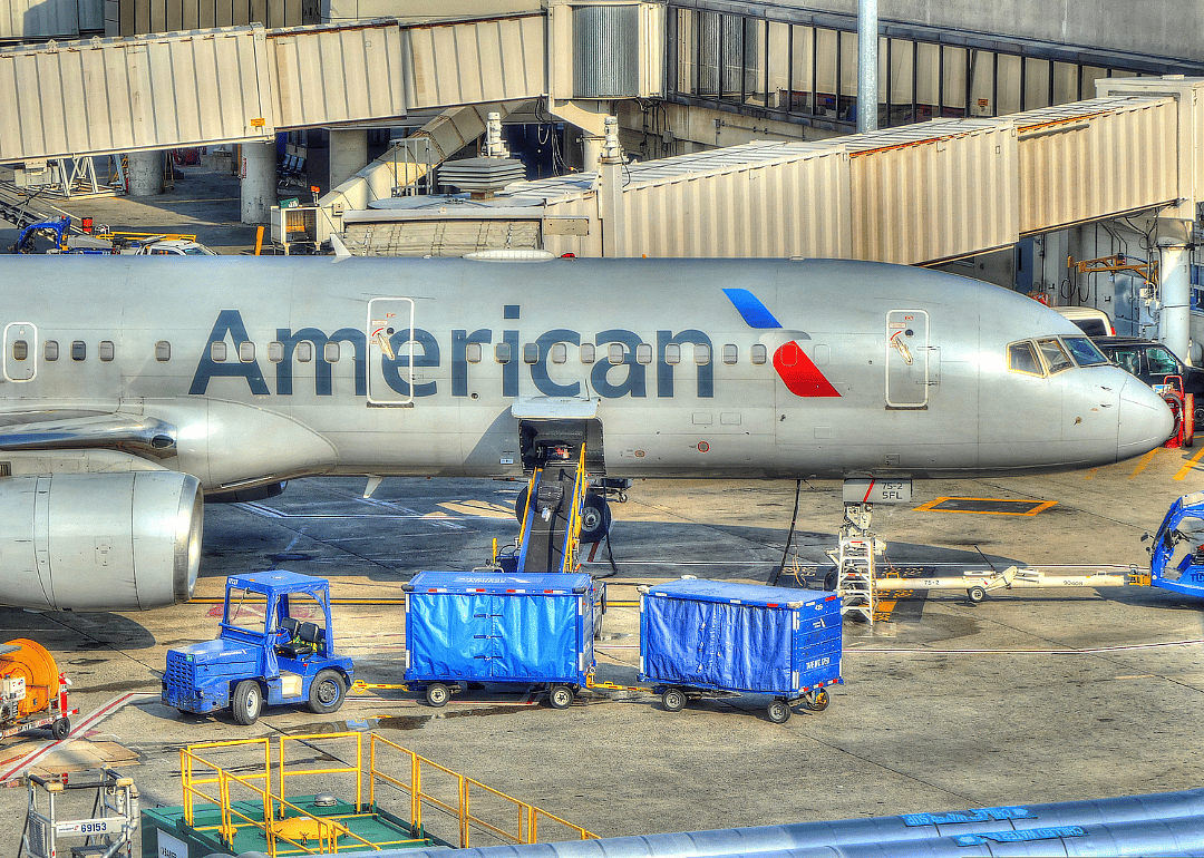 Baggage offloading of an American Airlines plane at Logan Airport Boston