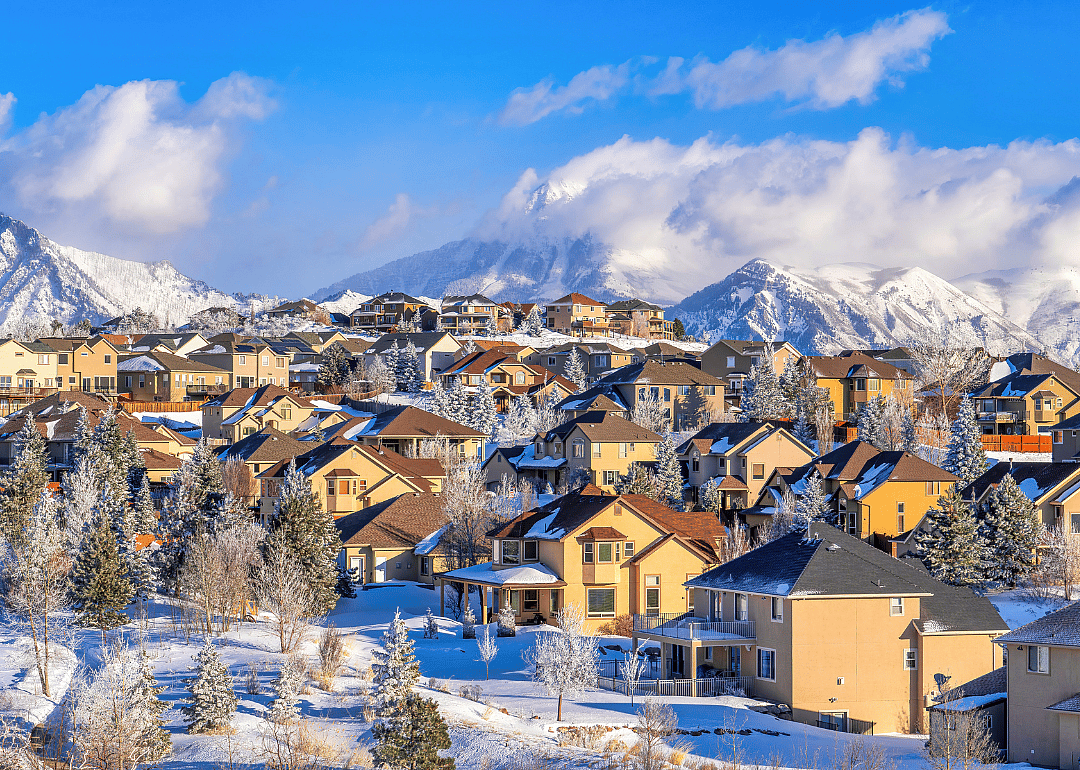 Homes in Highland, Utah, in a premium neighborhood with mountain and sky views.