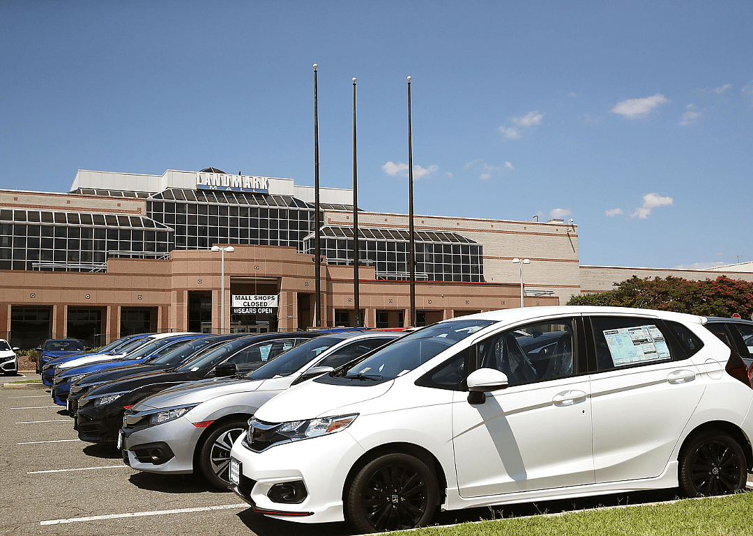 A dealership storing new cars in the parking lot at the Landmark Mall in Virginia.