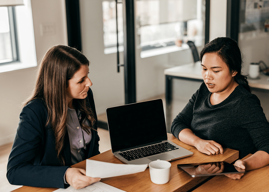 A lawyer speaking with a client.