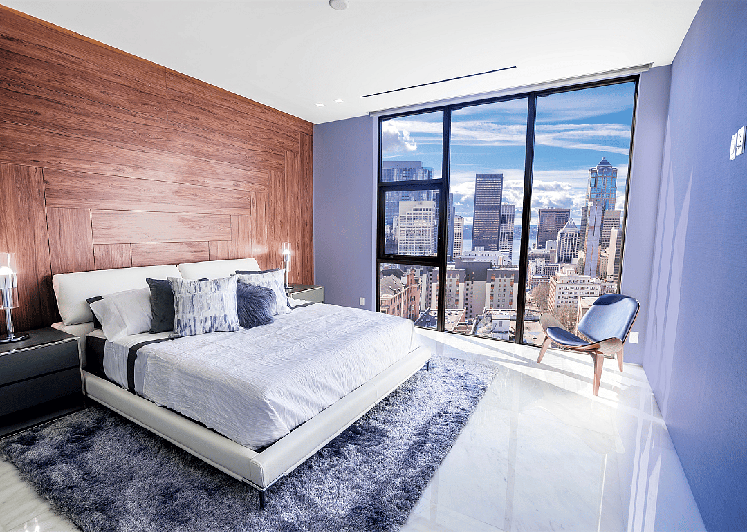 Modern, contemporary bedroom in Seattle with views of the financial district.