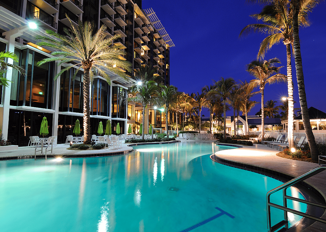 A resort swimming pool at twilight in Florida.