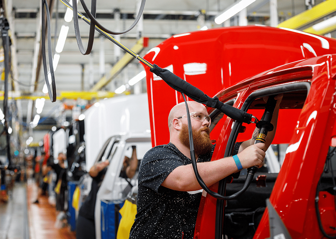 An assembly line at an auto manufacturing plant.