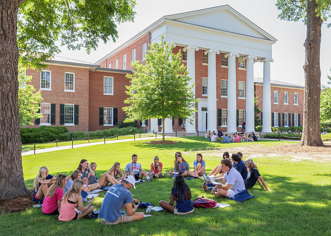 Students sitting in a circle on the campus of the University of Mississippi.