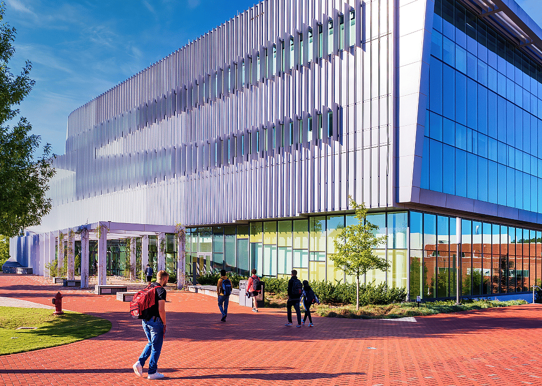 Students walking toward the James Hunt Library at North Carolina State University in Raleigh.