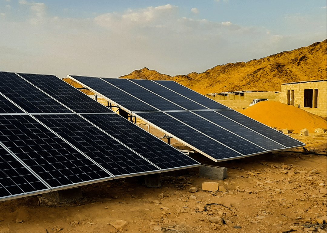Solar panels powering housing on the outskirts of the city.