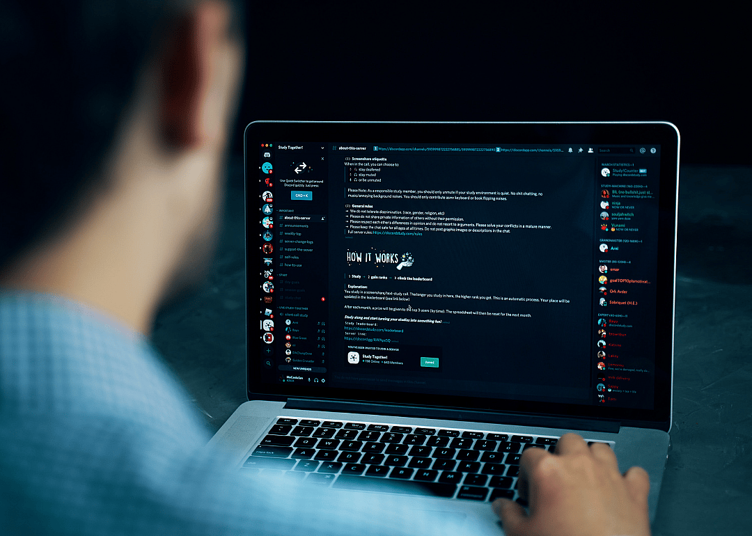 A person using Discord on their laptop.