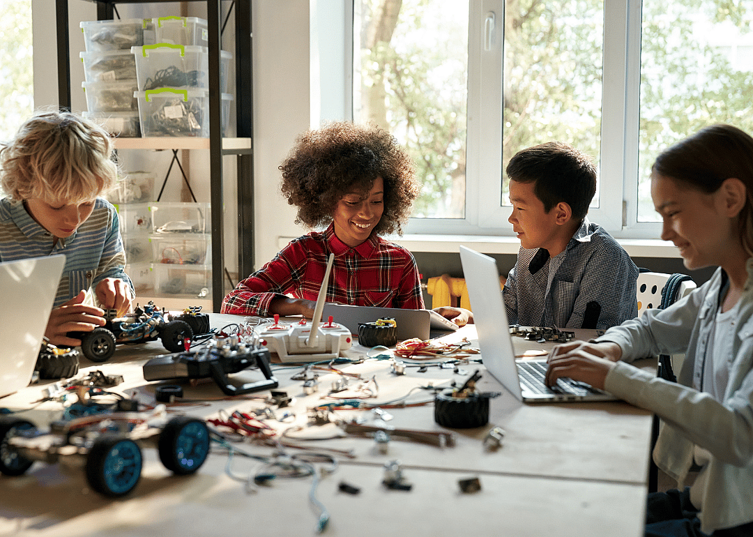 A group of students meeting for robotics club