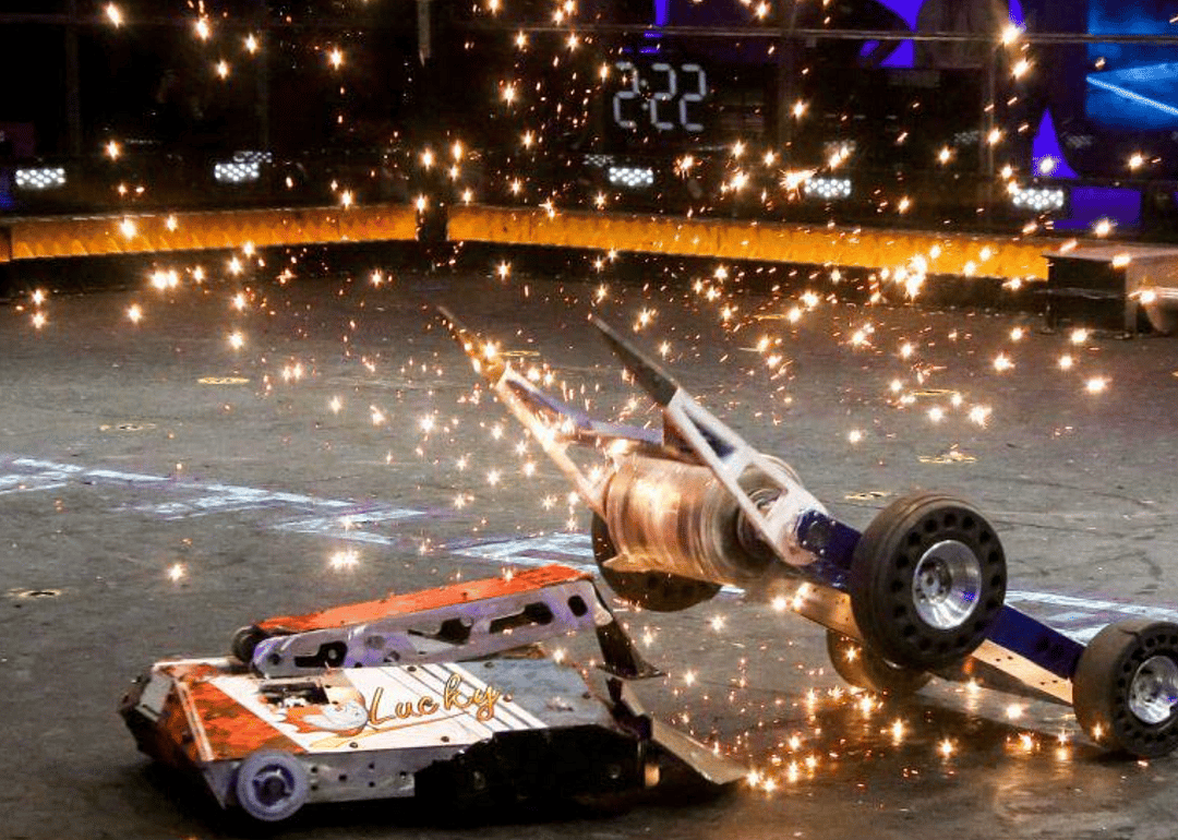 Two battle bots duking it out in an arena
