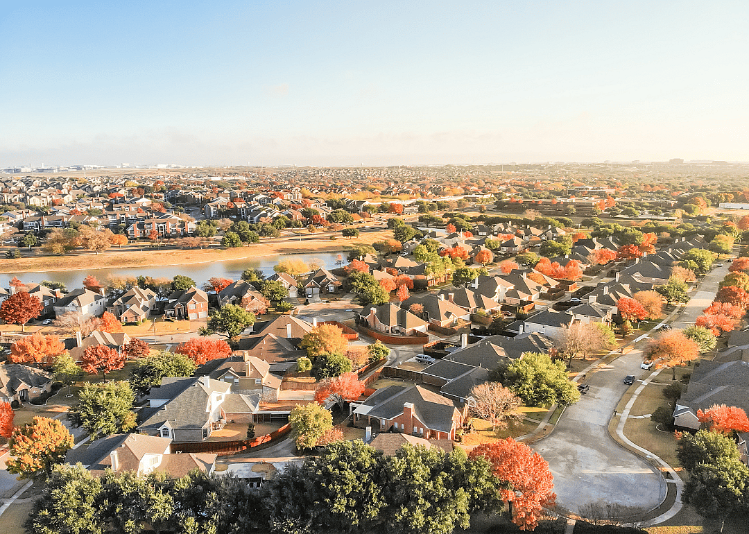 An aerial view of a waterfront residential subdivision's cul-de-sac, dead-end street in suburban Dallas.