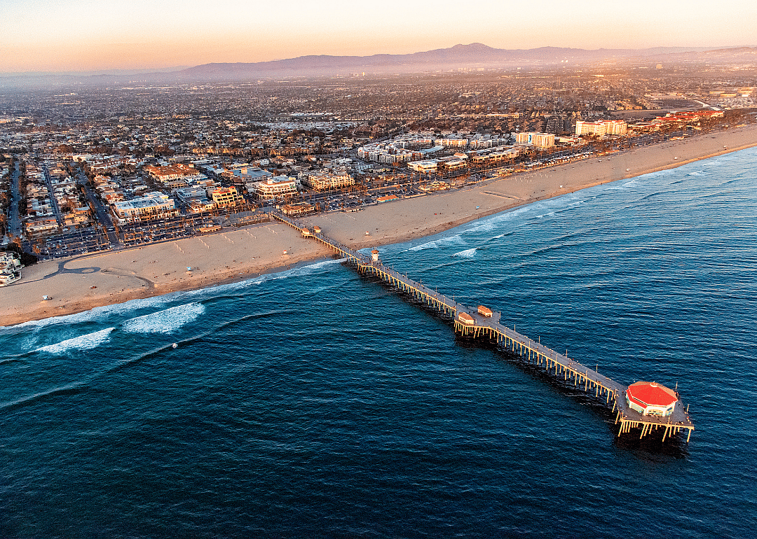 Aerial of pier and coastline.