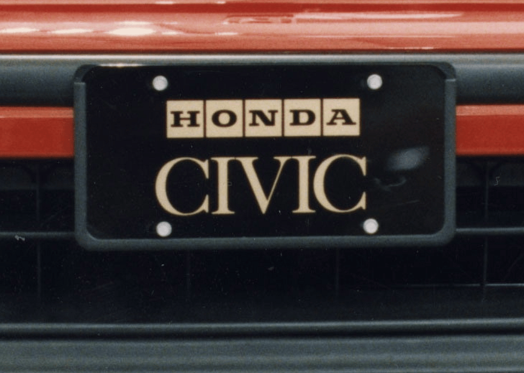 A closeup of a Honda Civic's license plate.