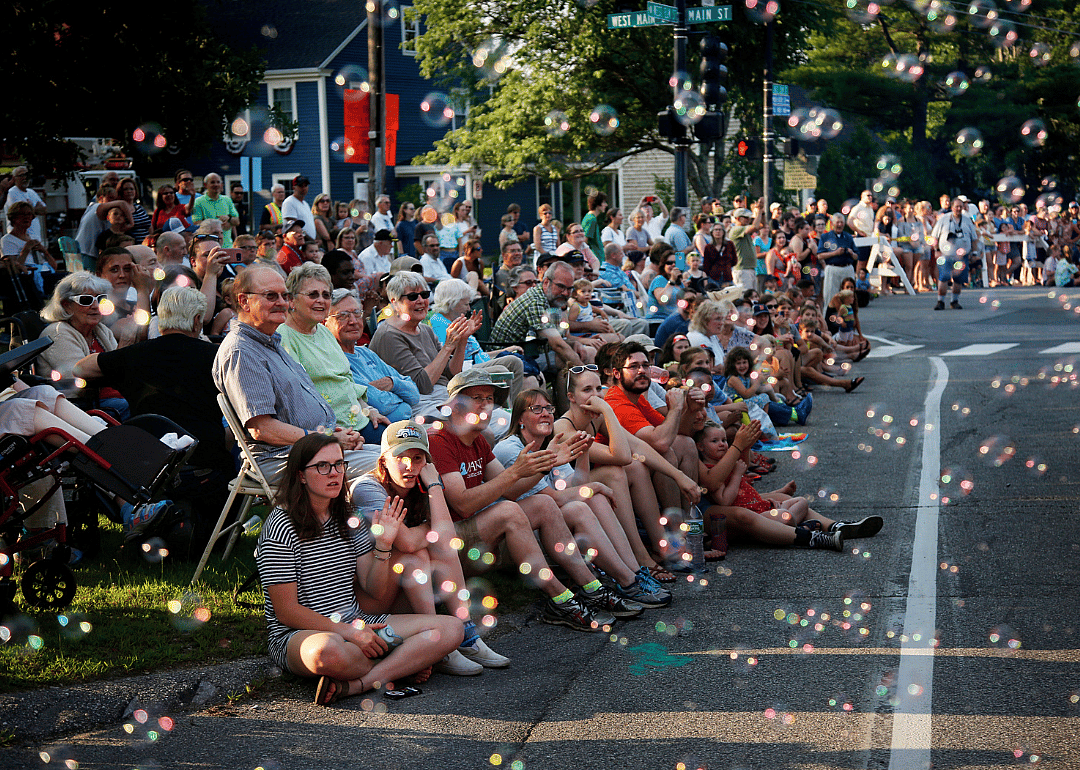 Bubbles filling the air as people watch the Yarmouth Clam Festival parade in Yarmouth, Maine.