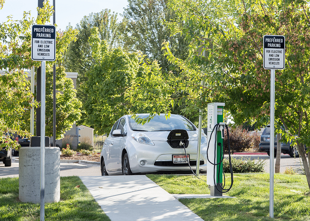 An electric car charging at a preferred parking charging station outside the Bown Crossing Library in Boise, Idaho.