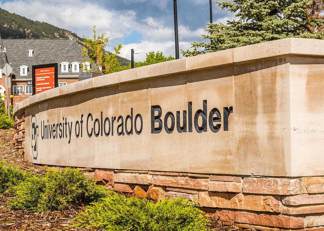 The entrance to the University of Colorado Boulder, with the campus in the background.