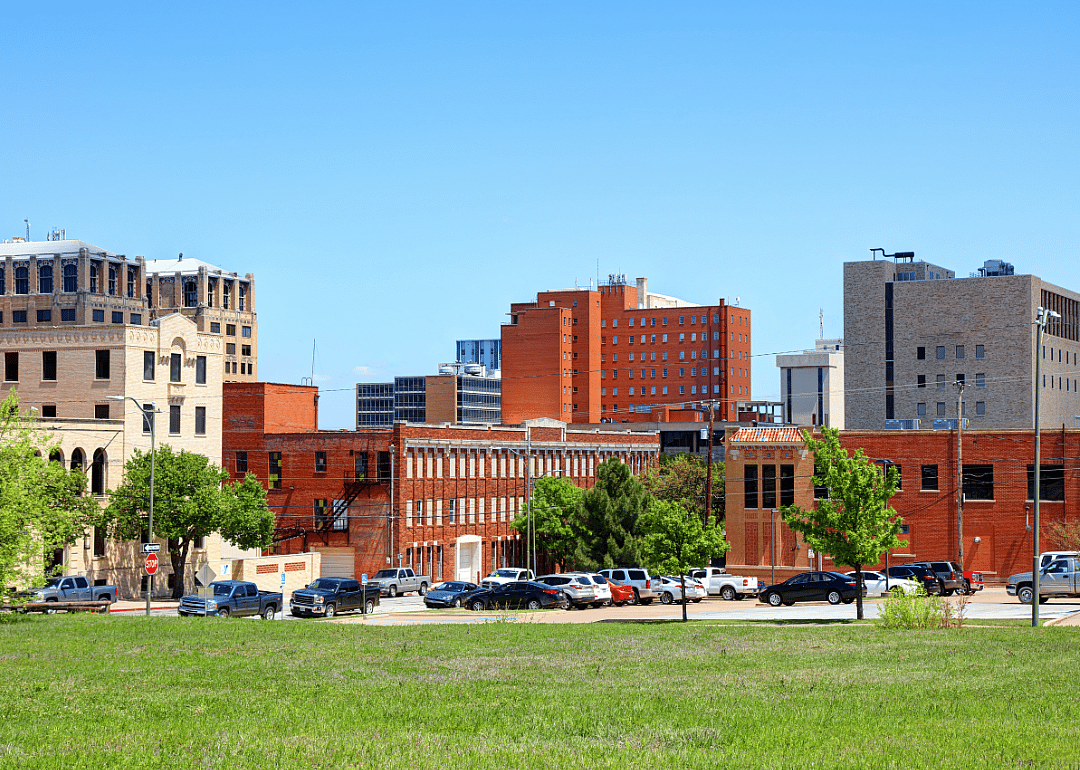 A view of a city with red brick buildings.