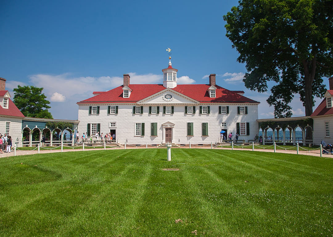 A historic tourist attraction building on the water.