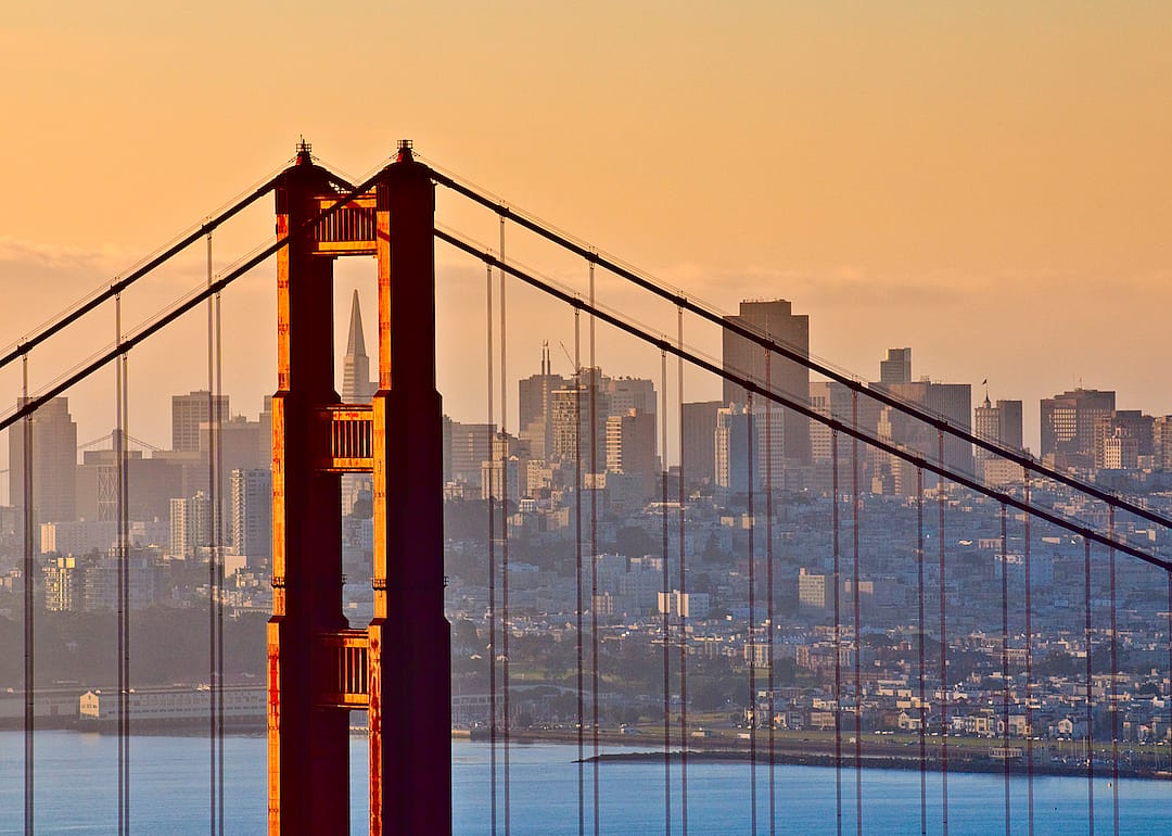 The Golden Gate Bridge with downtown San Francisco in the background.