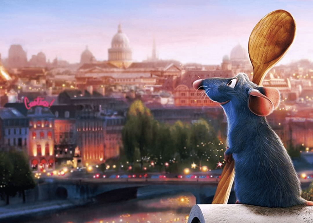 A cartoon rat holding a wooden spoon and looking at a view of a city.